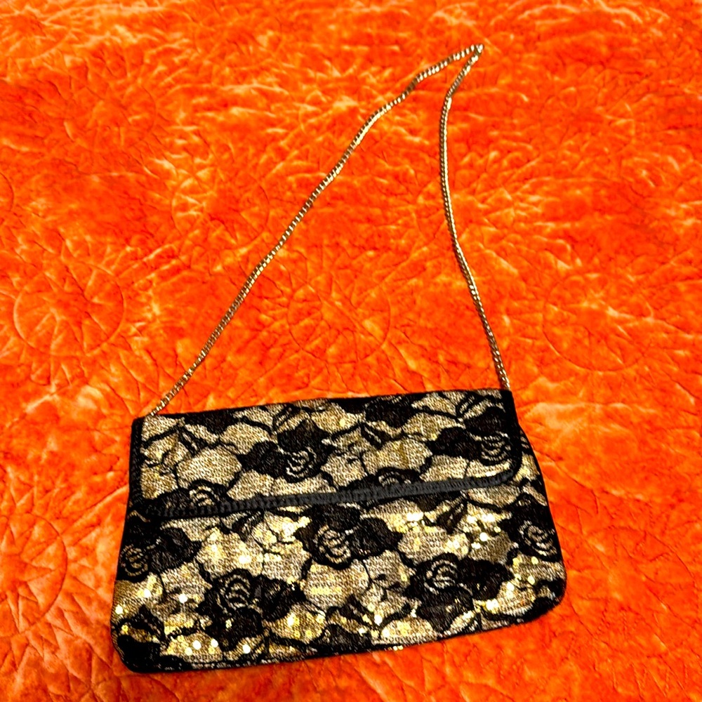 Clutch or strap bag.